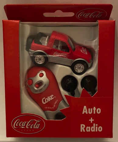 10107-1 € 10,00 coca cola funset auto radio met oordopjes.jpeg